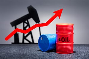 Oil barrels with a red up arrow on grey background. Oil chart. spotting-fake-fob-oil-offers